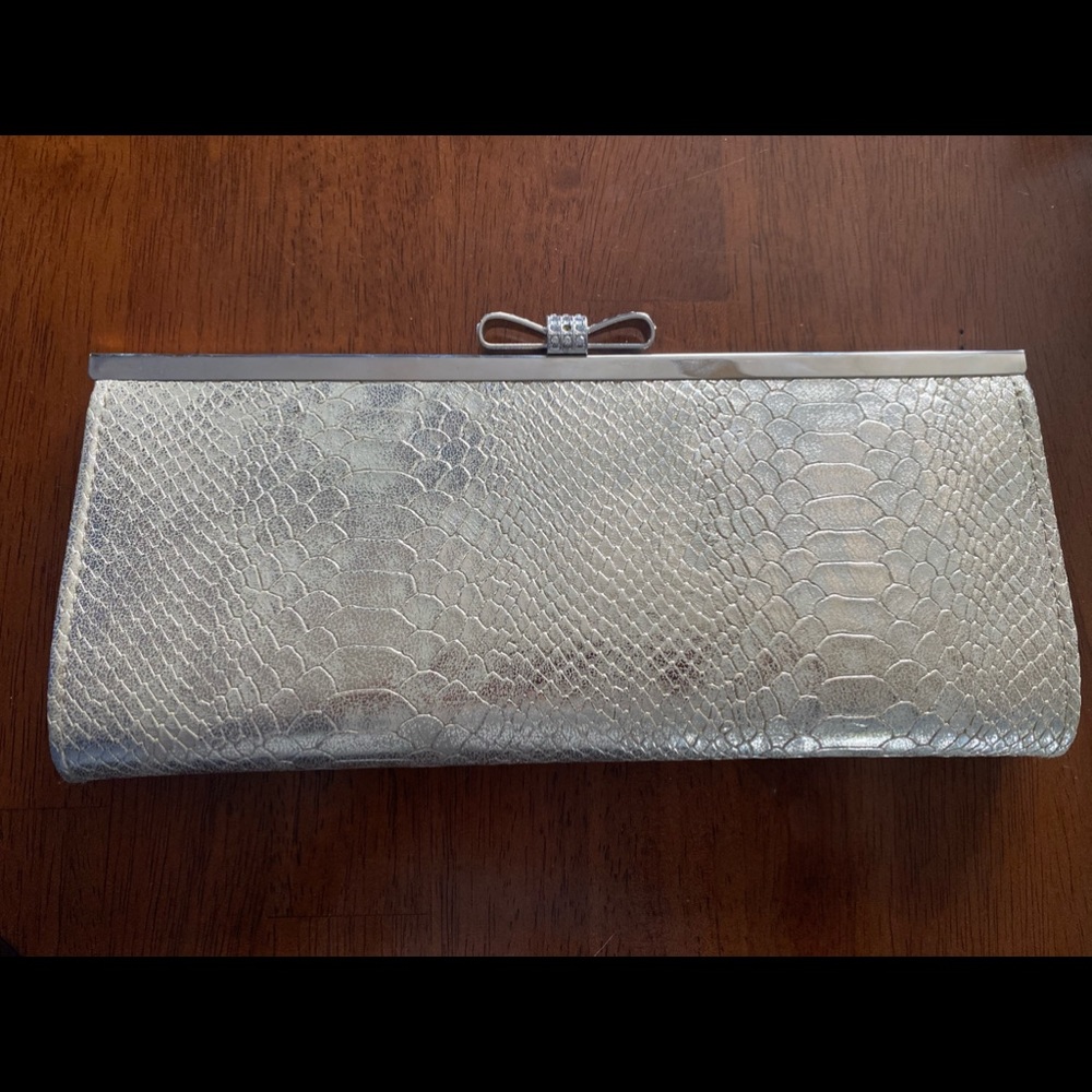 Gold snake print clutch
